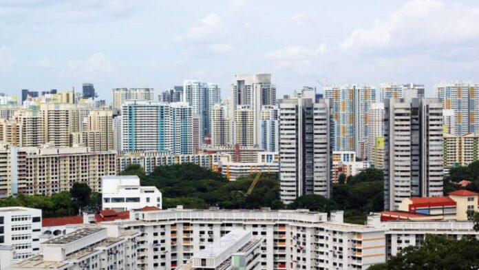 Cityscape,Of,Many,Modern,Tall,Skyscraper,Condominiums,,Apartments,,With,Houses